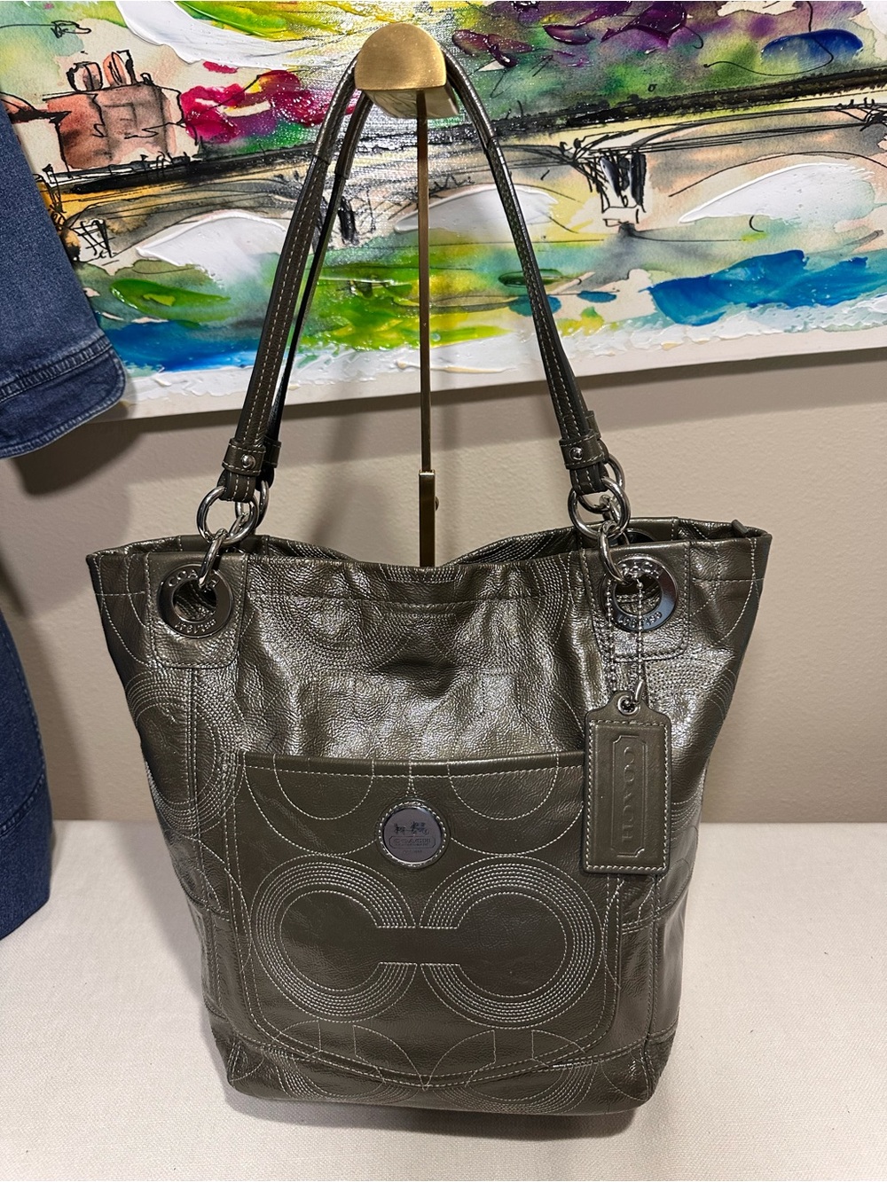 Coach Alex Stitched Patent Tote in a metallic Ollive Green color